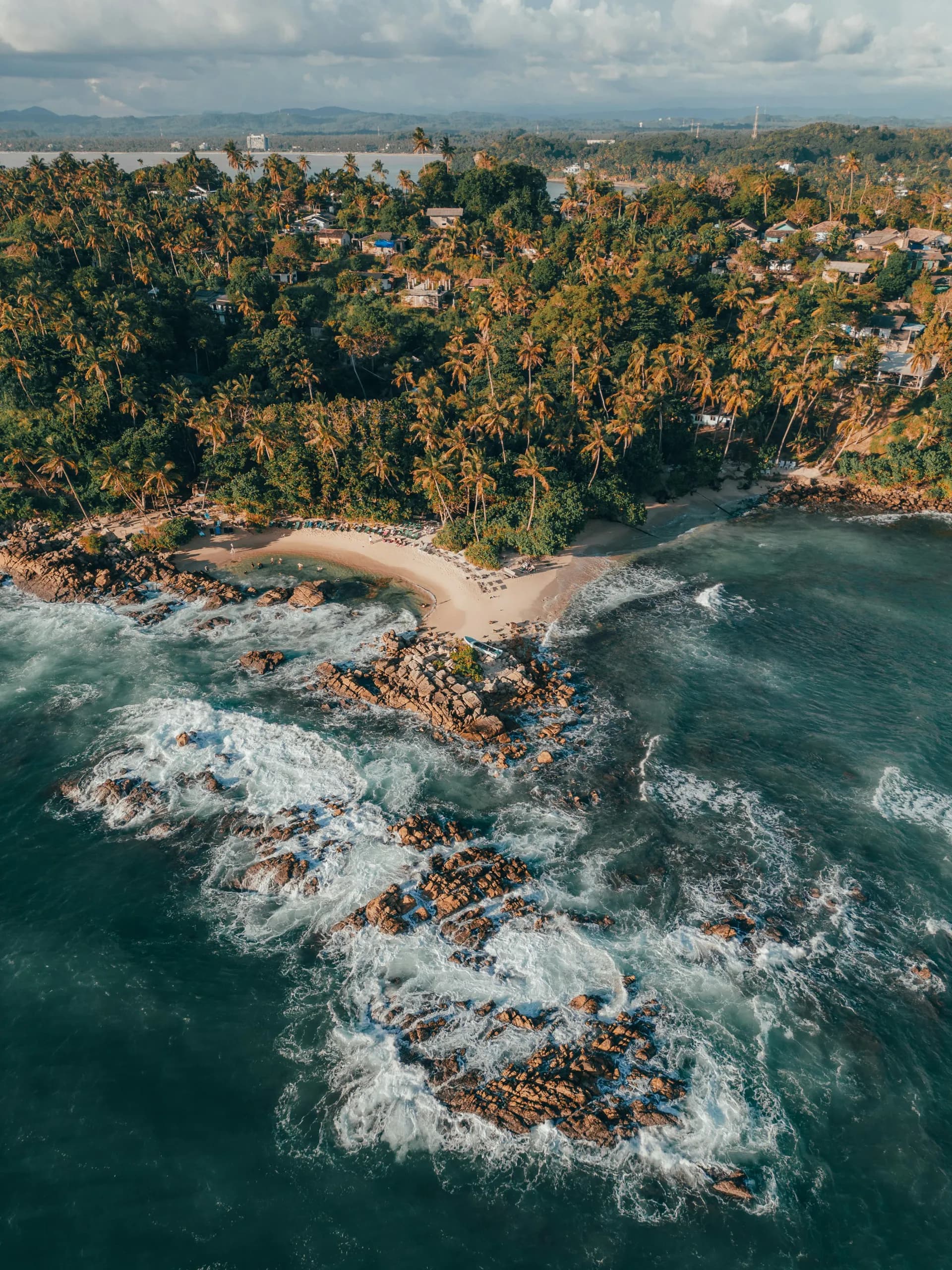 Beautiful Sri Lankan beach with golden sand and turquoise waters