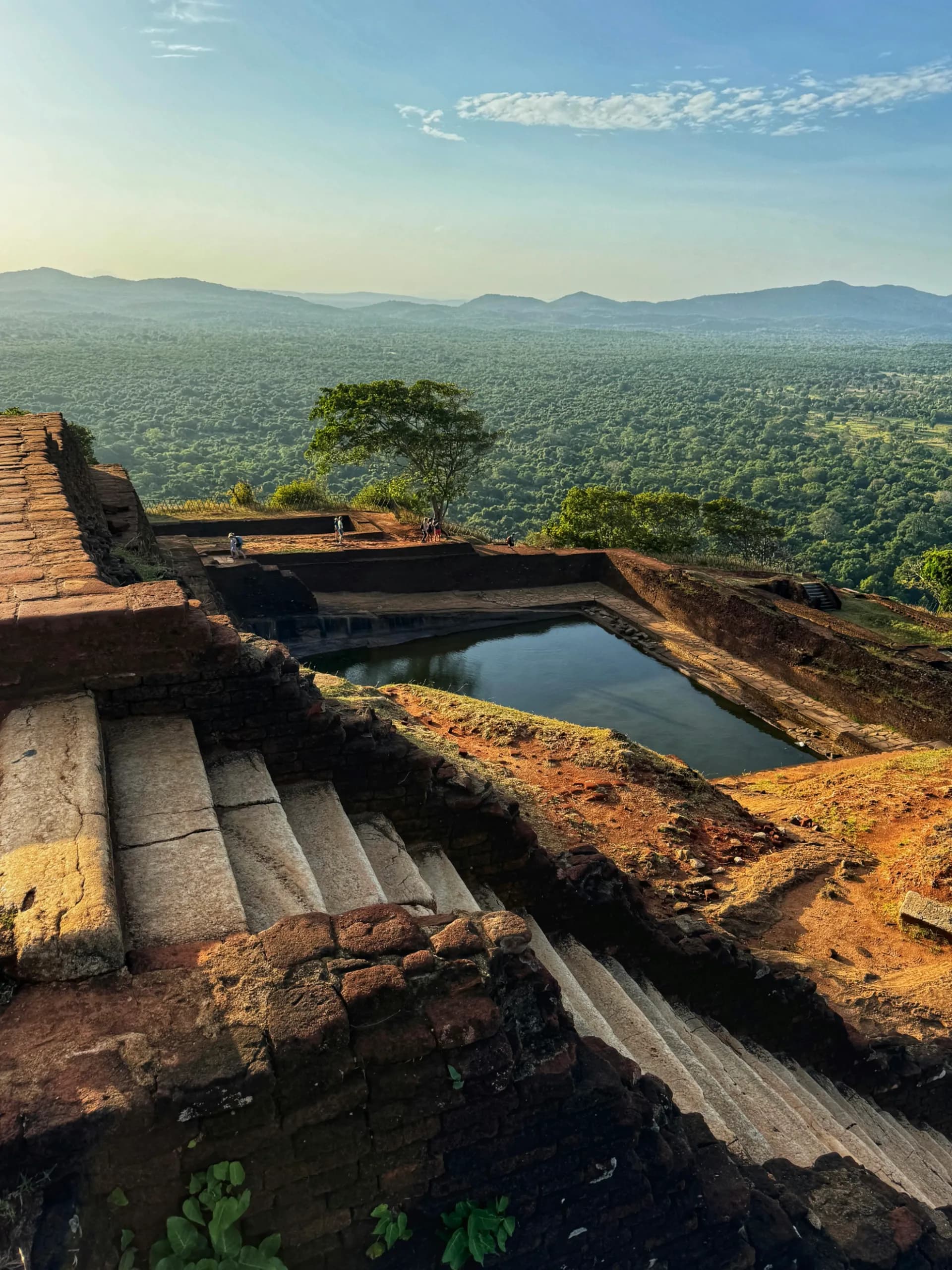 Sigiriya Rock Fortress surrounded by lush greenery