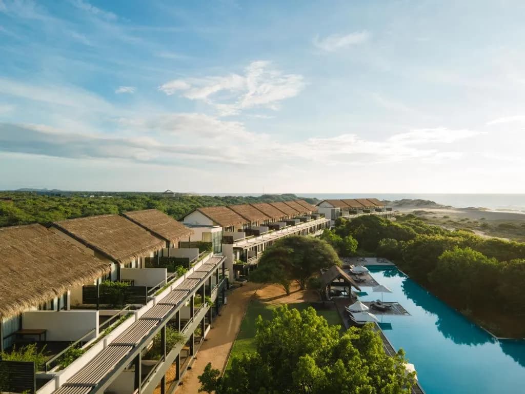 Jetwing Yala luxury resort pool at sunset