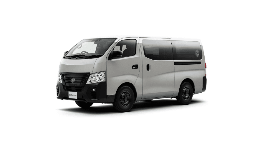 Luxury black passenger van near a beach resort